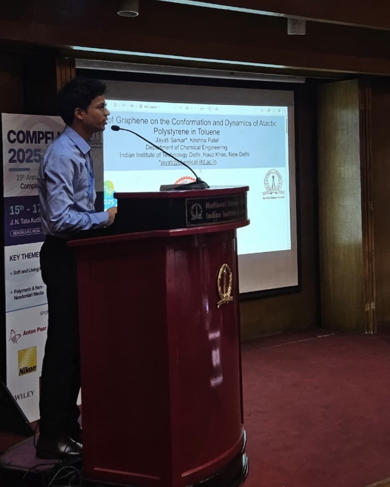 Presenting flash talk at CompFlu 2025